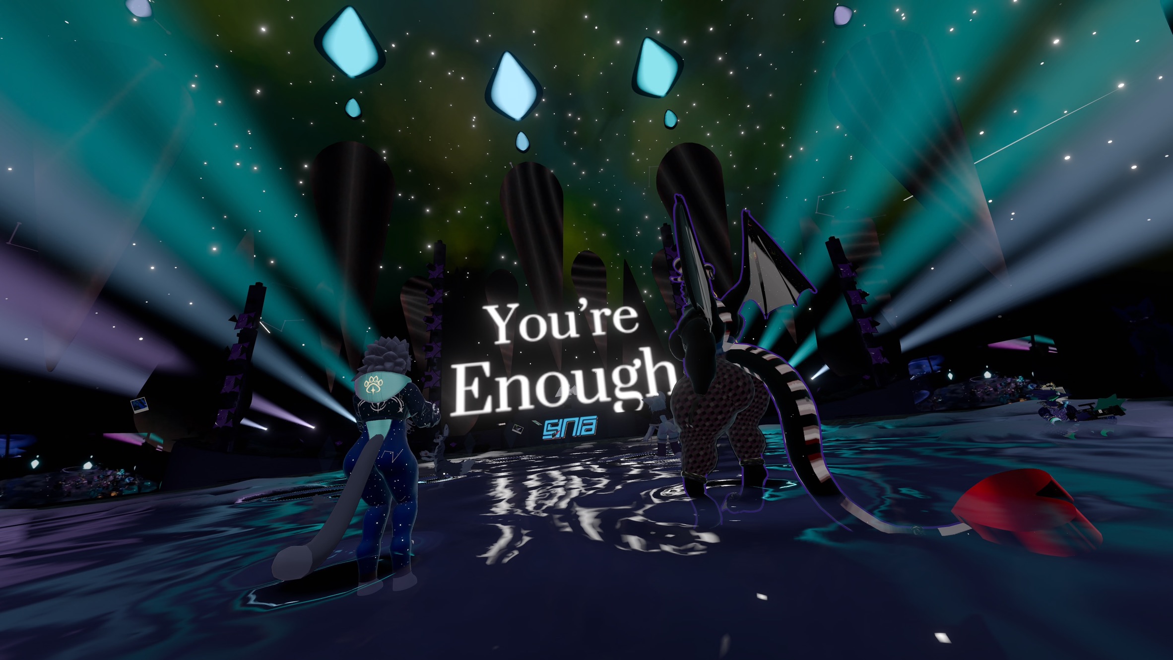 VRChat screenshot, a dragon and a lion dancing at Furality Somna in front of a big screen saying 'You're Enough'