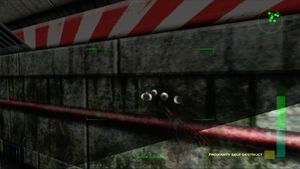 Perfect Dark screenshot - a bunch of bullet decals on the wall.